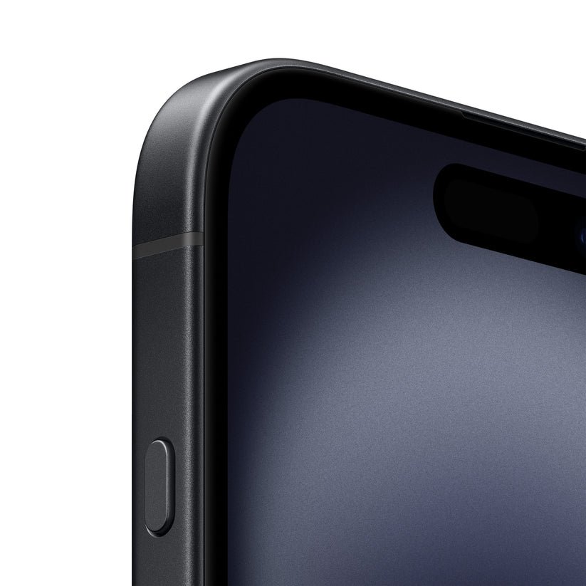 A close-up macro view of the dark-colored iPhone 16 showing the top-left corner of the display, the pill-shaped Dynamic Island cutout, and the textured side button housing along the dark aluminum frame.