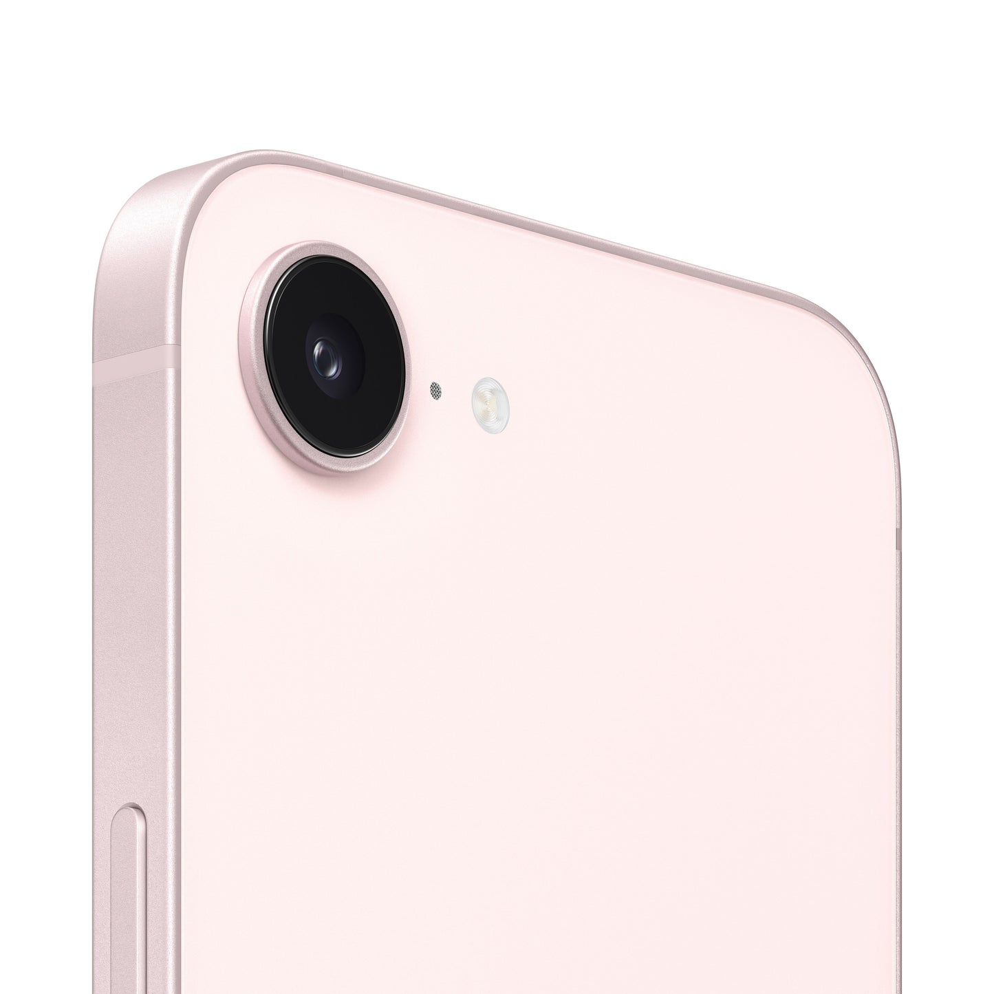 A close-up view of the pink smartphone's rear camera module, highlighting the single protruding lens, a tiny microphone hole, and the adjacent circular flash ring.