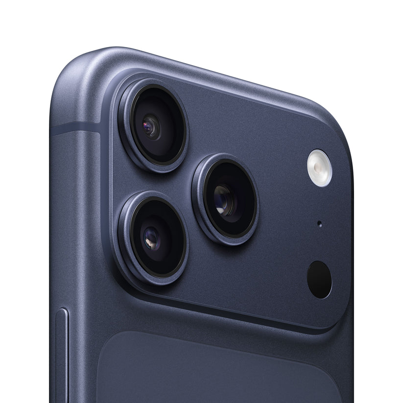 A close-up view of the rear camera module on the iPhone 17 Pro in Deep Blue, showcasing the triple-lens arrangement, flash, microphone, and the distinctive raised camera housing.