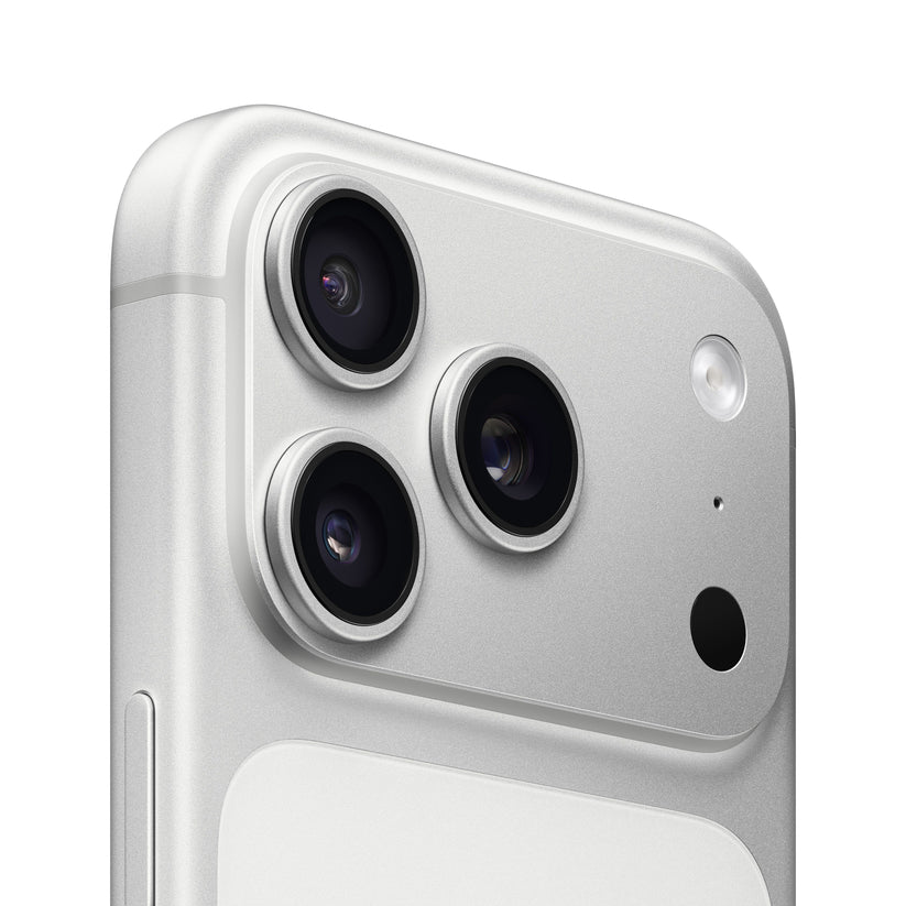A close-up view of the silver iPhone 17 Pro back, showcasing its triple-lens camera module, flash, and sleek metallic finish